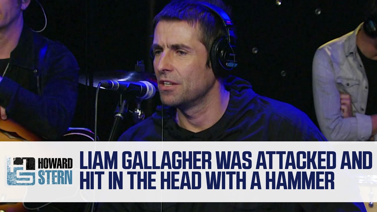 Liam Gallagher speaking into a microphone during his Howard Stern Show interview